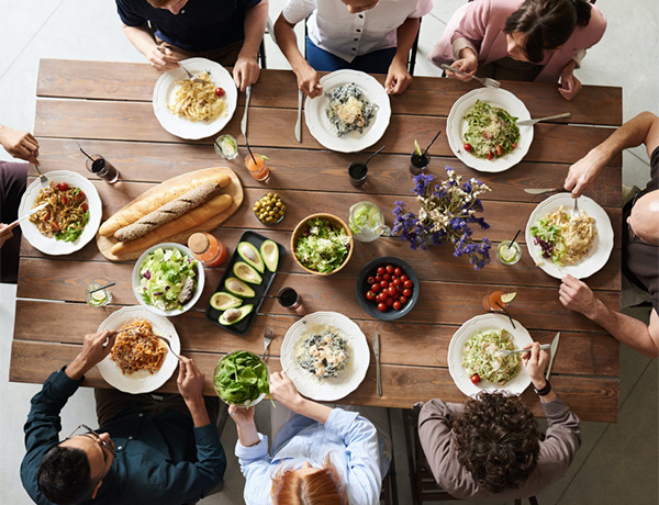 Table of people enjoying food