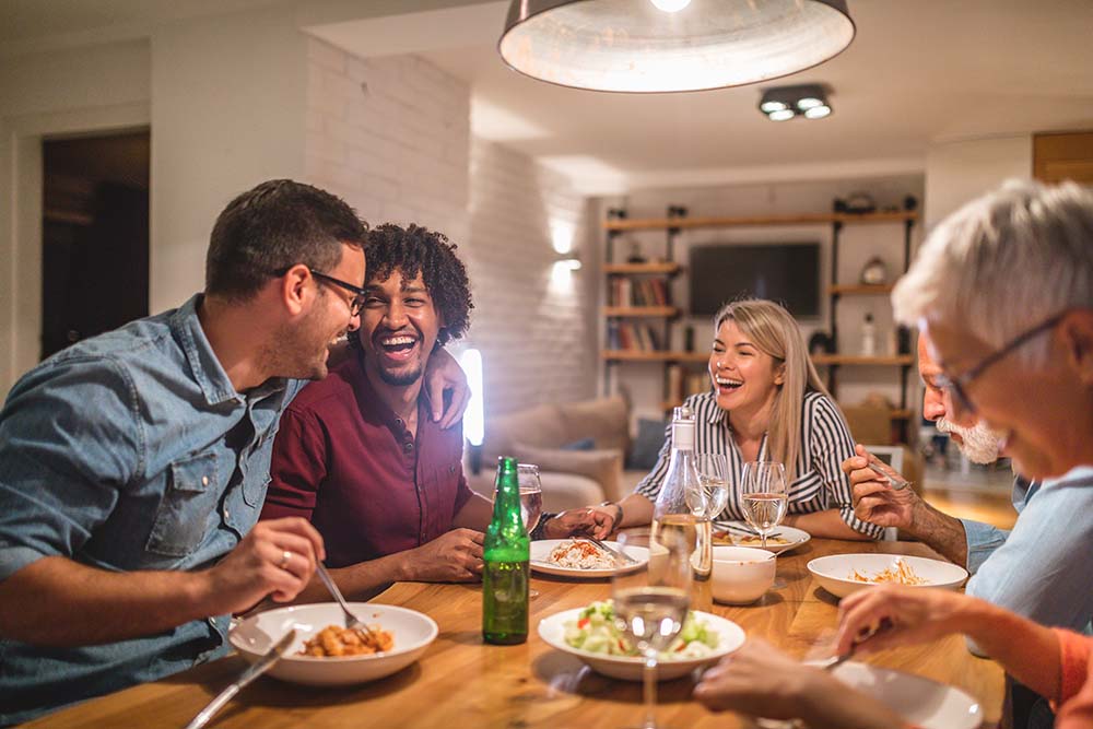 People at a table enjoying a meal.